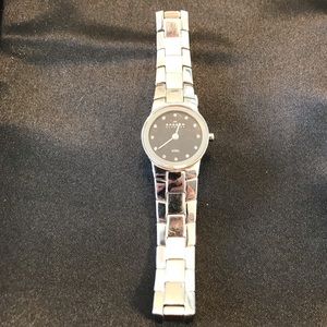 Stainless steel and diamond watch